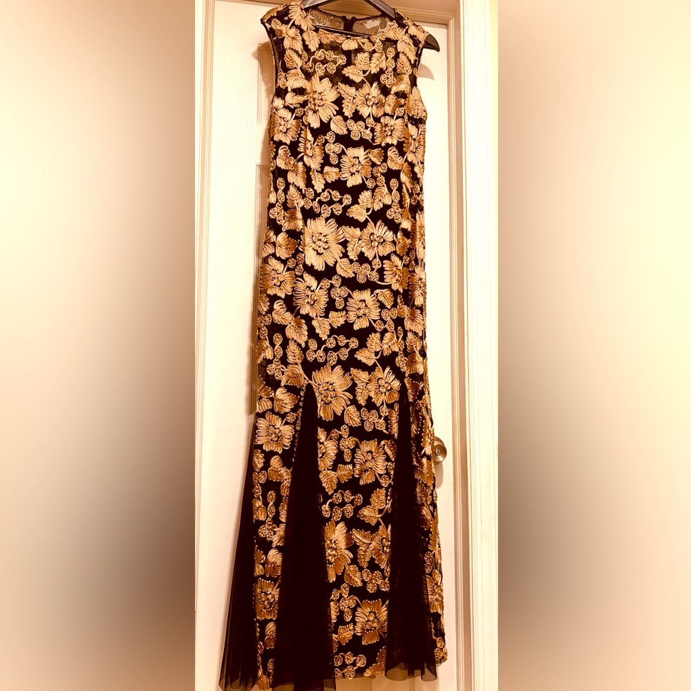 Size 12 long black and gold lace gown. Like new condition